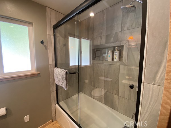 3402 Buttermilk Lane Arcata, CA 95521 - Photo 34 of 48 a bathroom with a bathtub and a shower