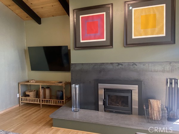 3402 Buttermilk Lane Arcata, CA 95521 - Photo 4 of 48 a living room with furniture and a fireplace