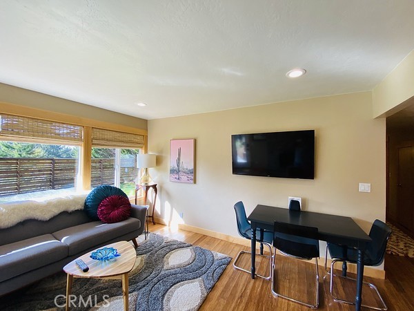 3402 Buttermilk Lane Arcata, CA 95521 - Photo 42 of 48 a living room with furniture and a flat screen tv