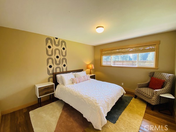3402 Buttermilk Lane Arcata, CA 95521 - Photo 45 of 48 a bedroom with a bed and window