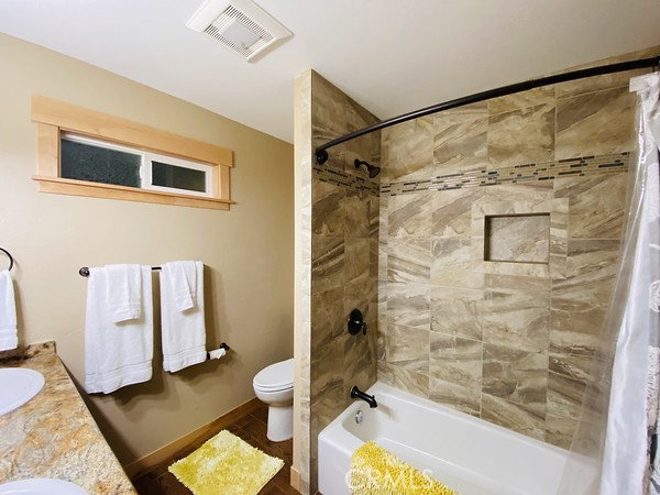 3402 Buttermilk Lane Arcata, CA 95521 - Photo 47 of 48 a bathroom with a sink mirror toilet and shower