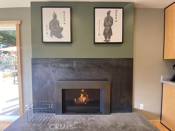 3402 Buttermilk Lane Arcata, CA 95521 - Photo 8 of 48 a fireplace with a painting on the wall