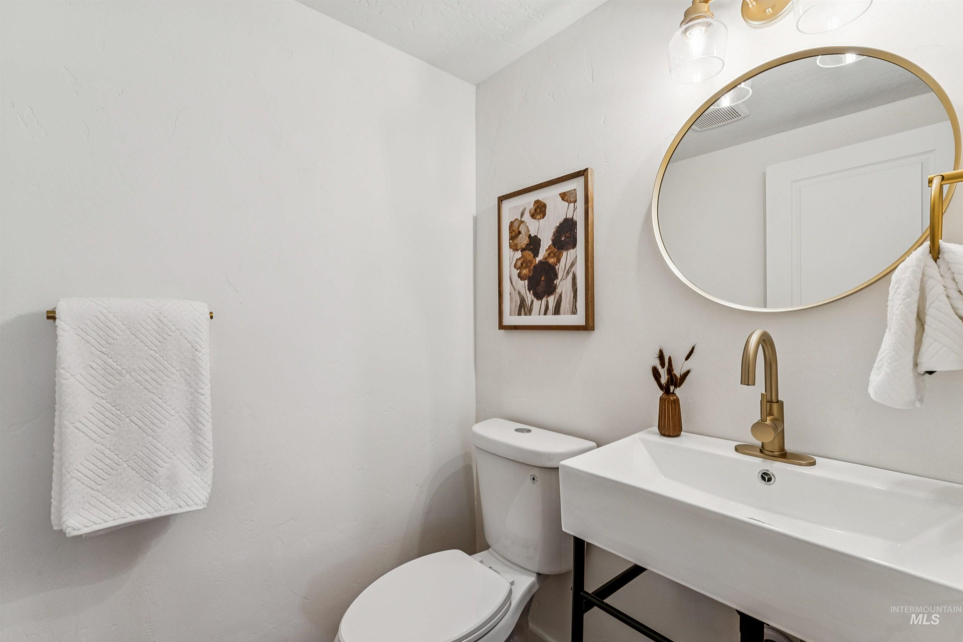 2419 West Hill Road Boise, ID 83702 - Photo 15 of 50 Bathroom with toilet and a sink