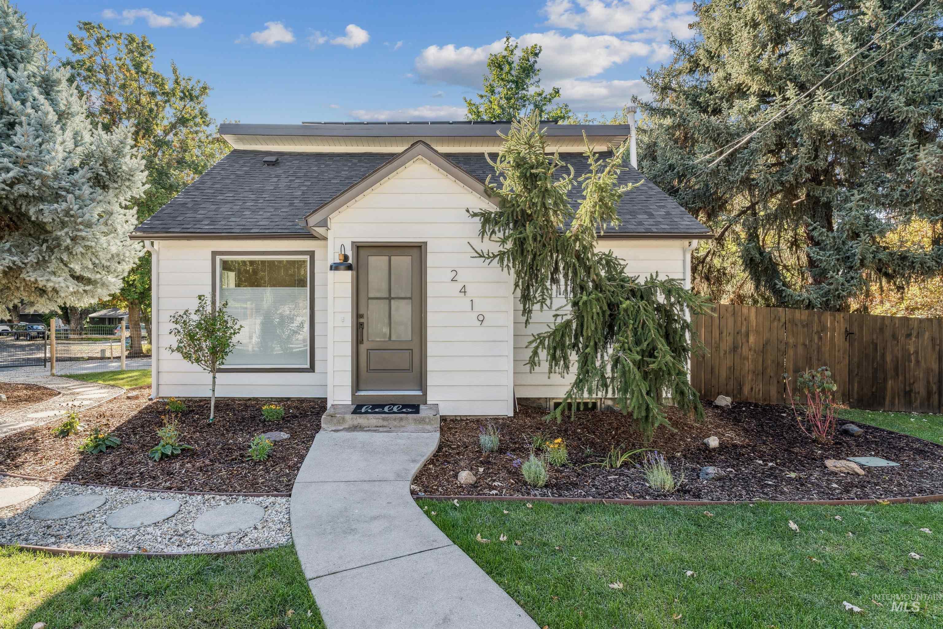 2419 West Hill Road Boise, ID 83702 - Photo 2 of 50 View of front of property featuring roof with shingles