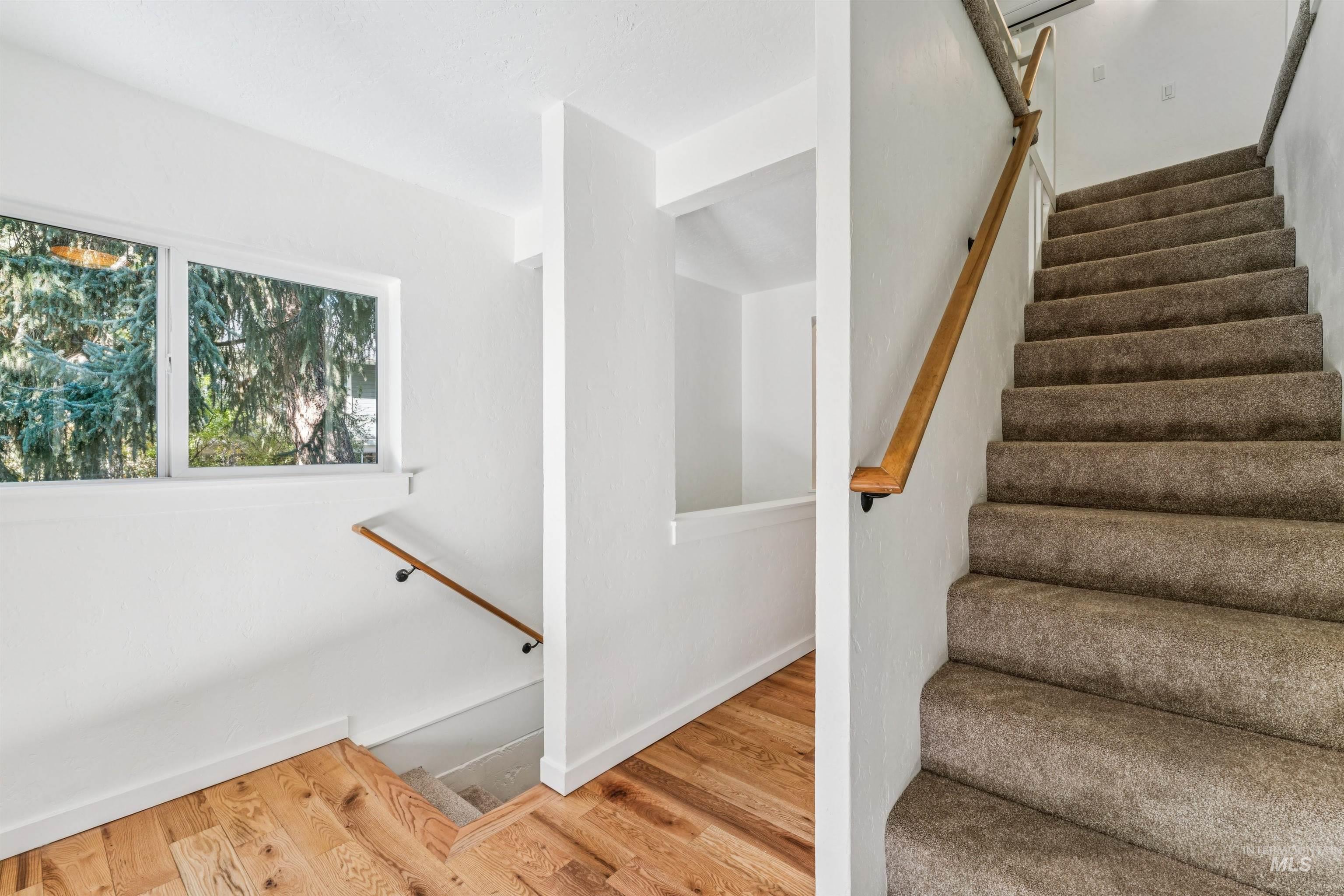 2419 West Hill Road Boise, ID 83702 - Photo 21 of 50 Stairs with wood finished floors and baseboards