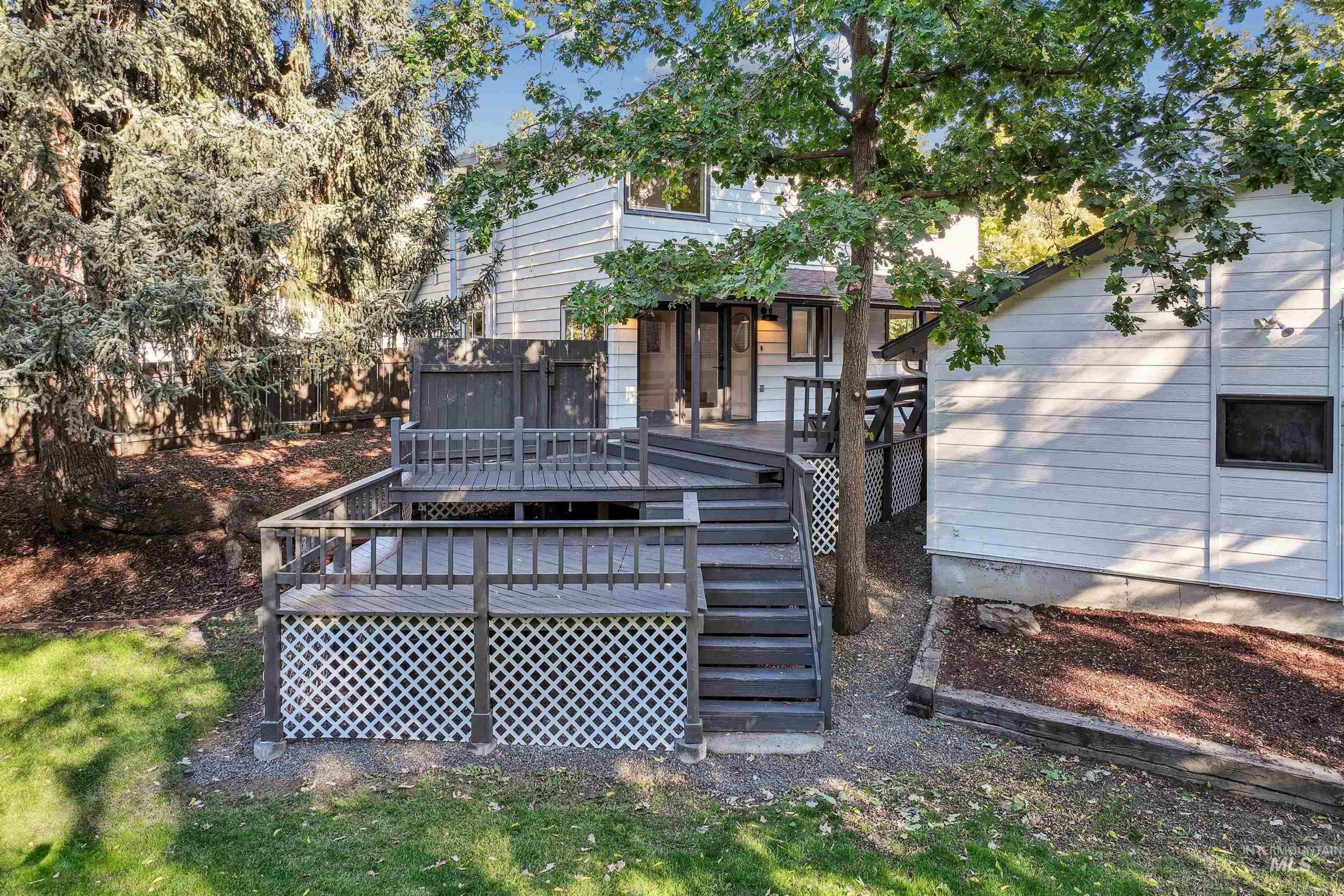 2419 West Hill Road Boise, ID 83702 - Photo 40 of 50 Back of property featuring a deck and stairs
