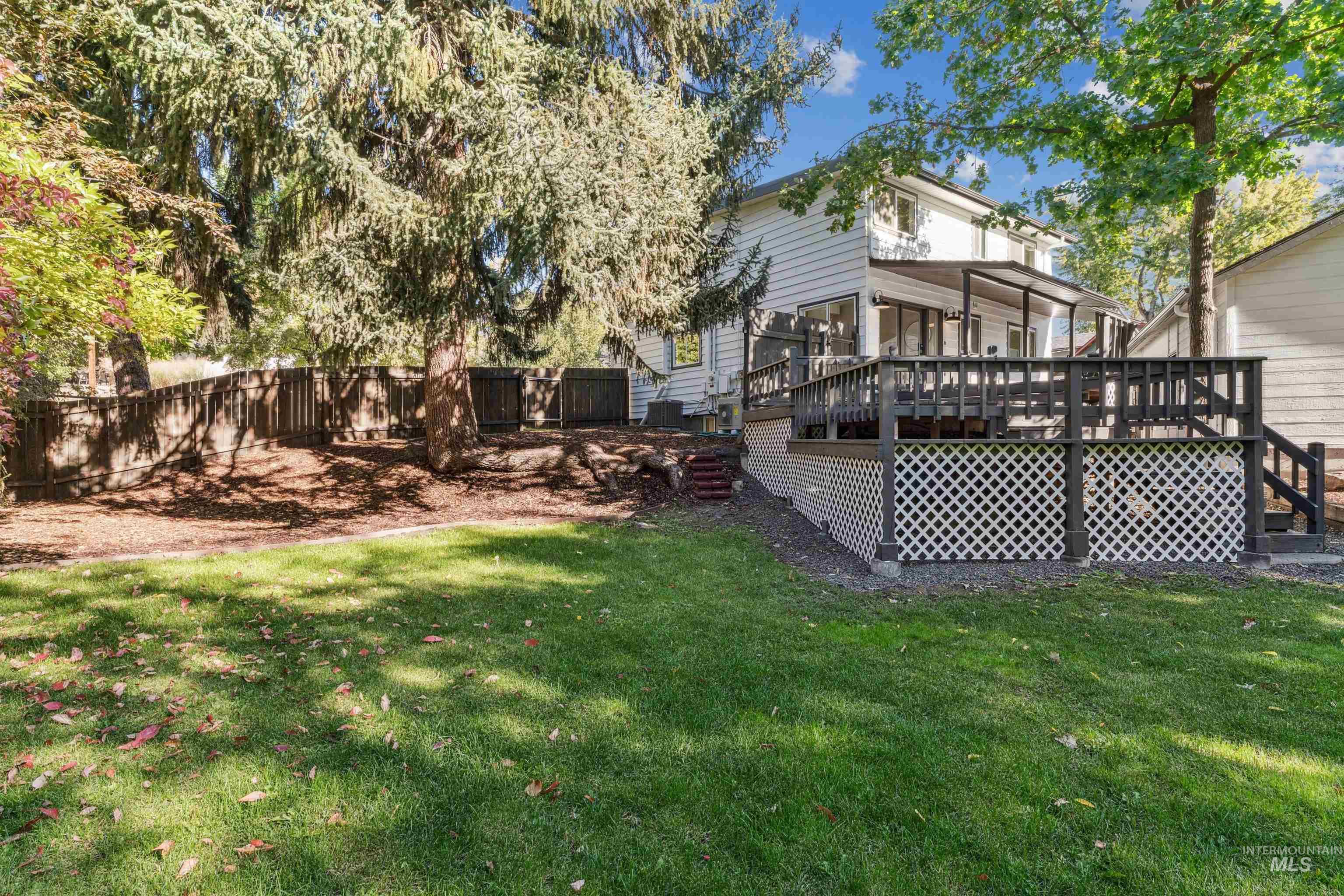 2419 West Hill Road Boise, ID 83702 - Photo 41 of 50 View of backyard with a deck and stairway