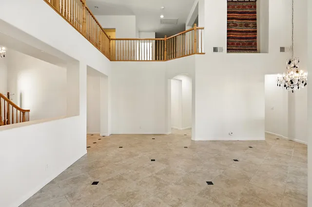 a living room with furniture fireplace and flat screen tv