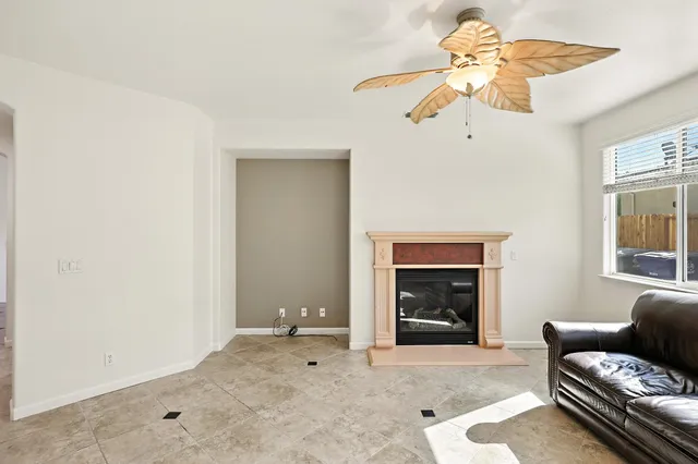 a kitchen with a stove a sink and a refrigerator