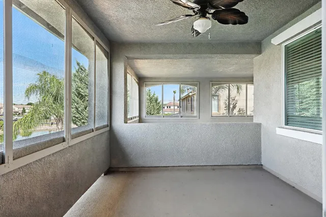 a bathroom with a bathtub and a toilet