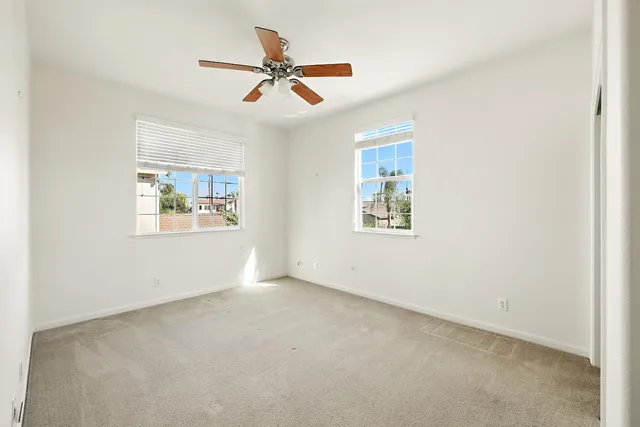 an aerial view of a house with a lake view