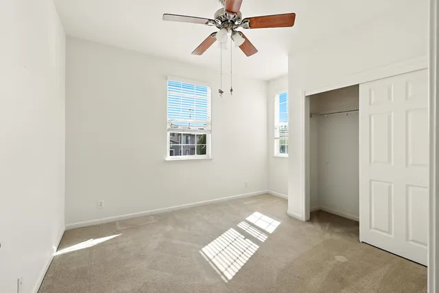 an aerial view of a house with a lake view