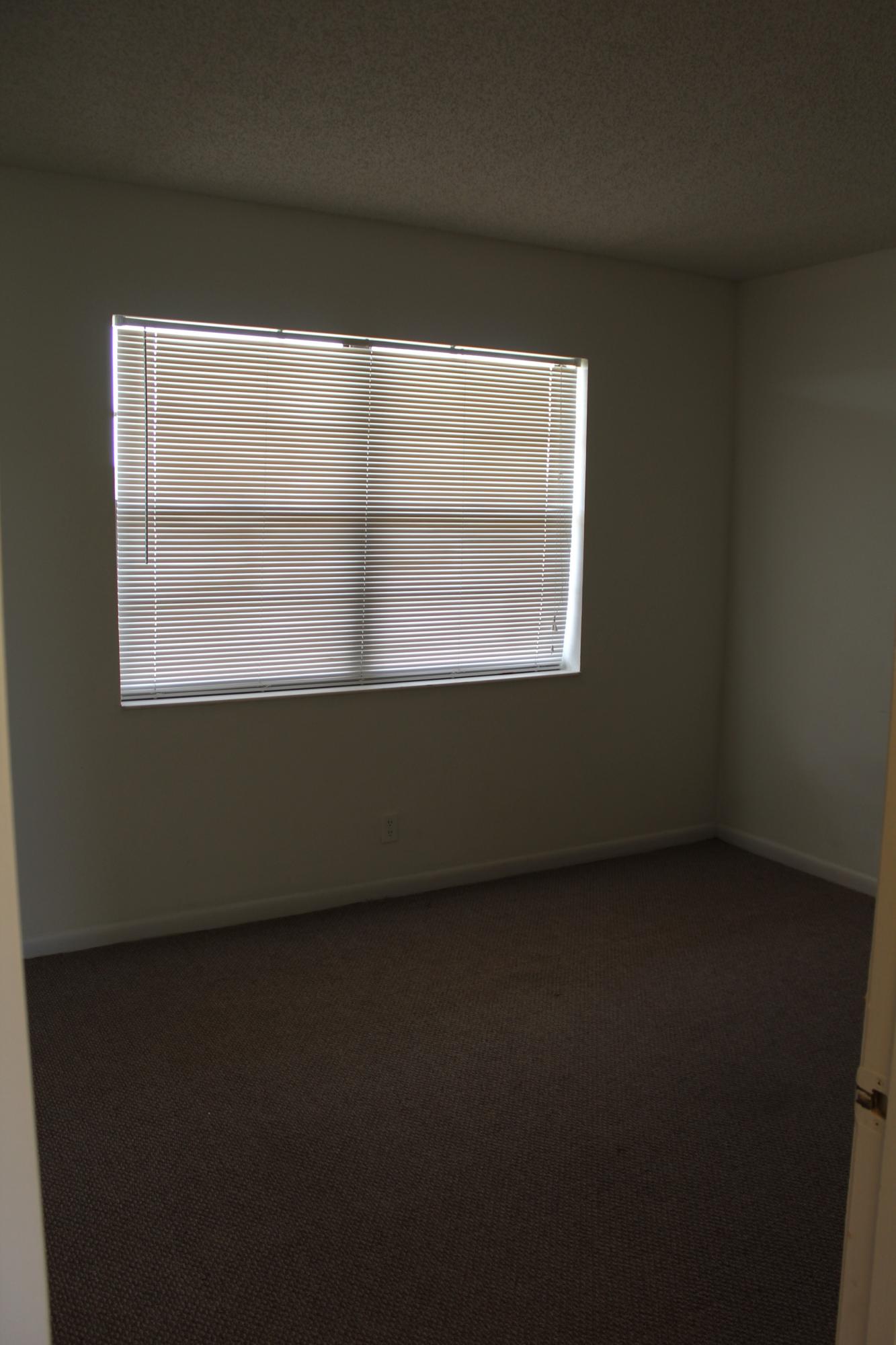 9235 Southwest 8th Street, Unit 503 Boca Raton, FL 33428 - Photo 11 of 27 a view of a window in a room