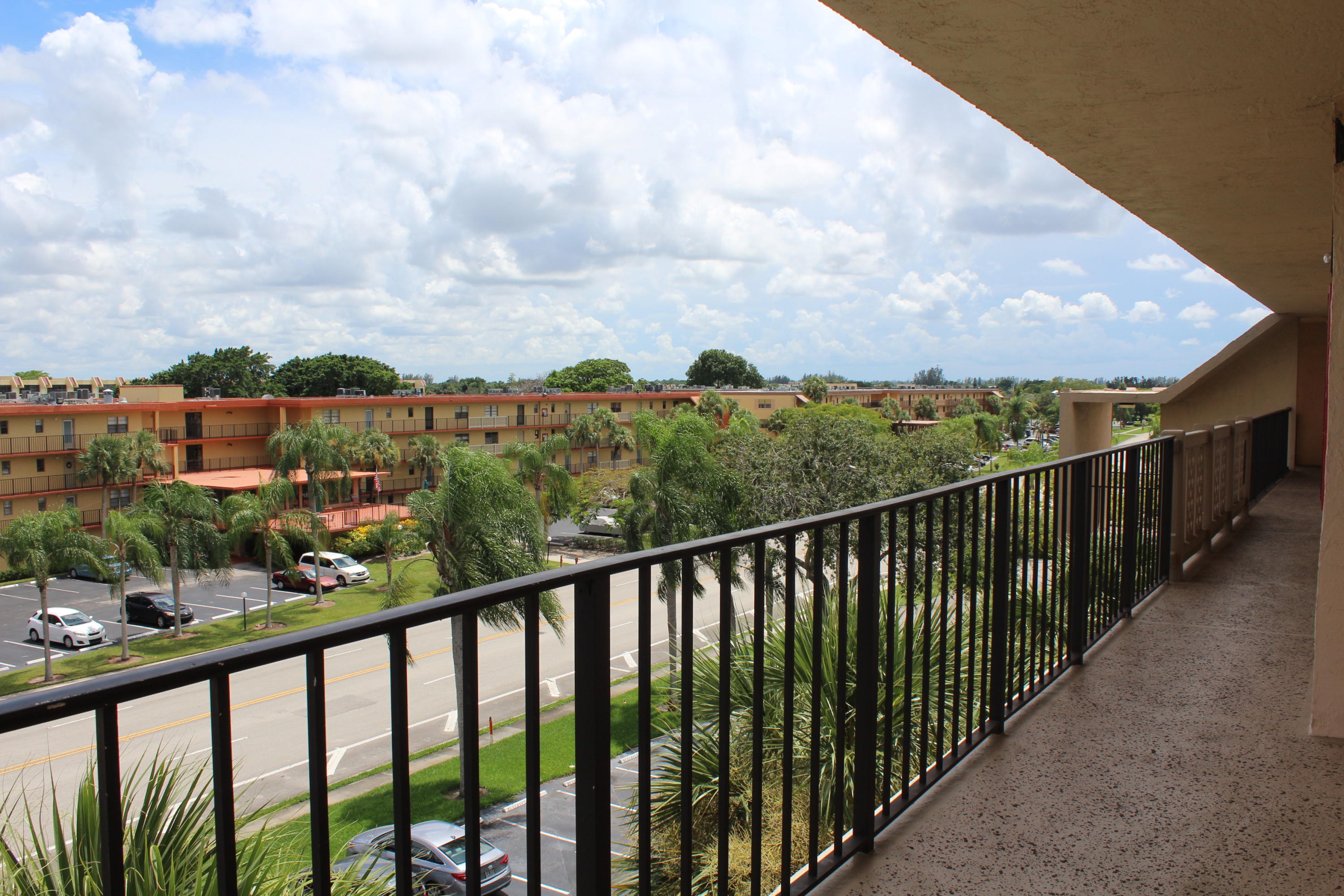 9235 Southwest 8th Street, Unit 503 Boca Raton, FL 33428 - Photo 24 of 27 a view of city and balcony