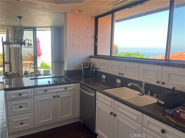 a bathroom with a sink and a window