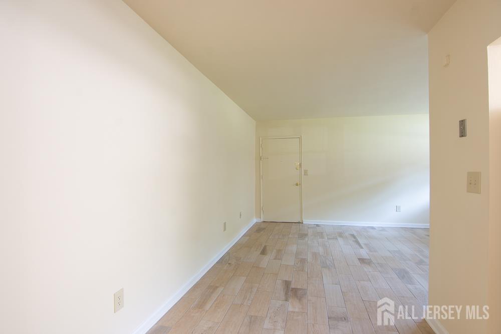 9 Koster Boulevard, Unit A Edison, NJ 08837 - Photo 14 of 15 a view of an empty room