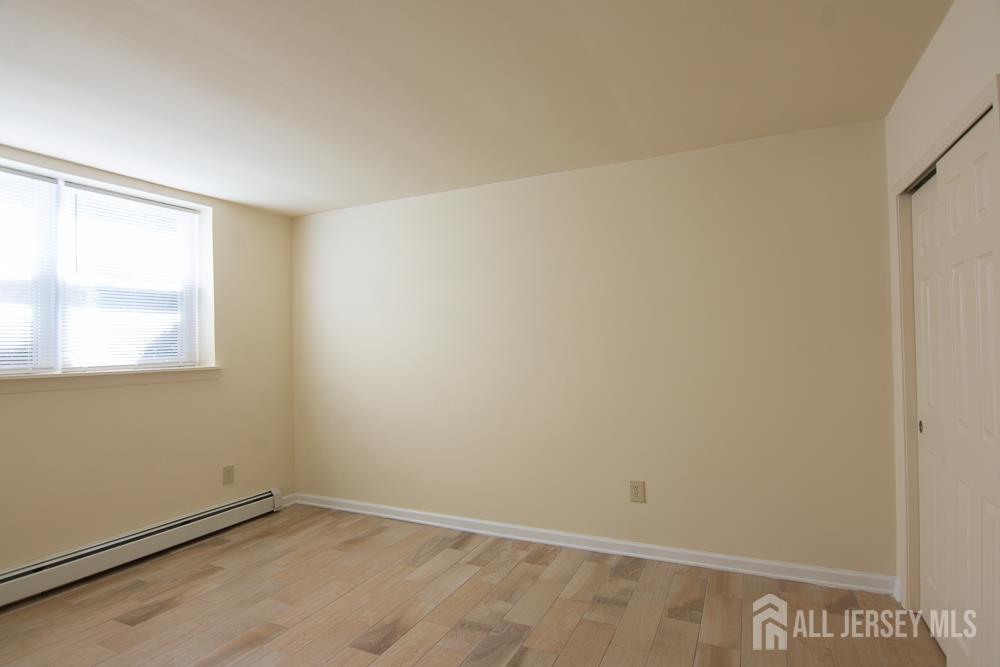 9 Koster Boulevard, Unit A Edison, NJ 08837 - Photo 8 of 15 a view of an empty room