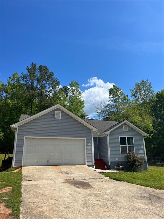 1973 George Brown Road Franklin, GA 30217 - Photo 1 of 1 a house with trees in the background