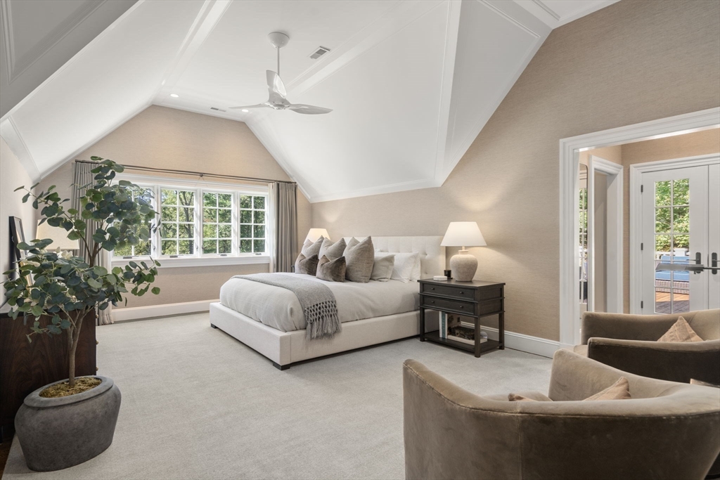 76 Robin Road Weston, MA 02493 - Photo 14 of 25 a living room with furniture and a potted plant