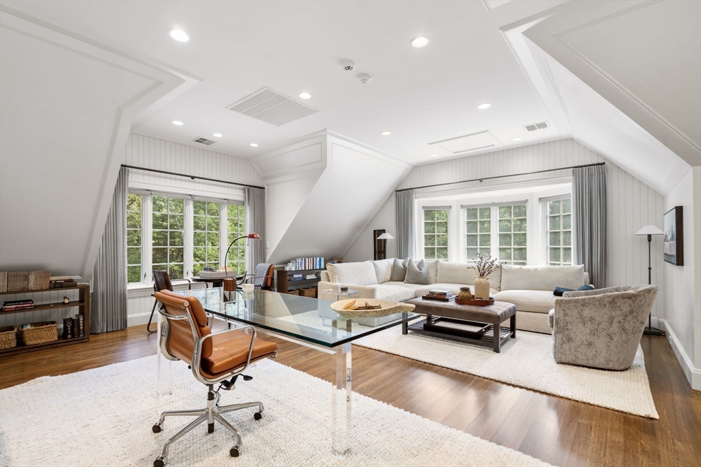 76 Robin Road Weston, MA 02493 - Photo 16 of 32 a living room with furniture and a large window