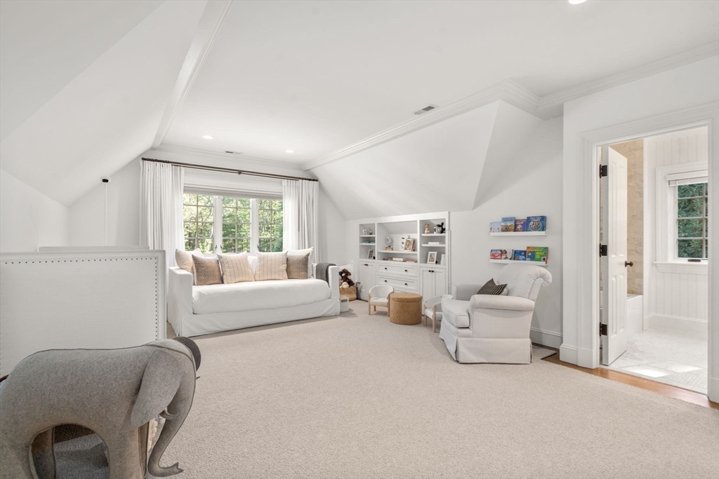 76 Robin Road Weston, MA 02493 - Photo 17 of 25 a living room with furniture and a large window