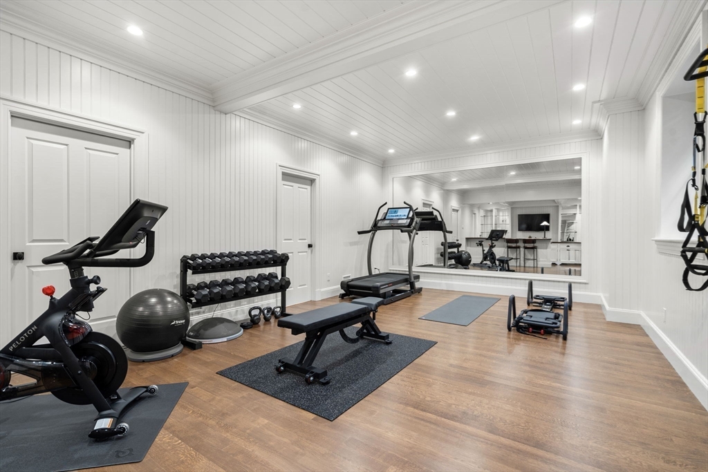 76 Robin Road Weston, MA 02493 - Photo 21 of 25 a view of a room with gym equipment