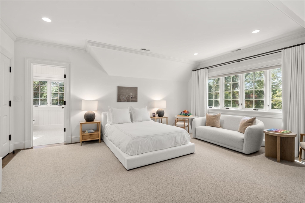 76 Robin Road Weston, MA 02493 - Photo 21 of 32 a bedroom with bed and large window