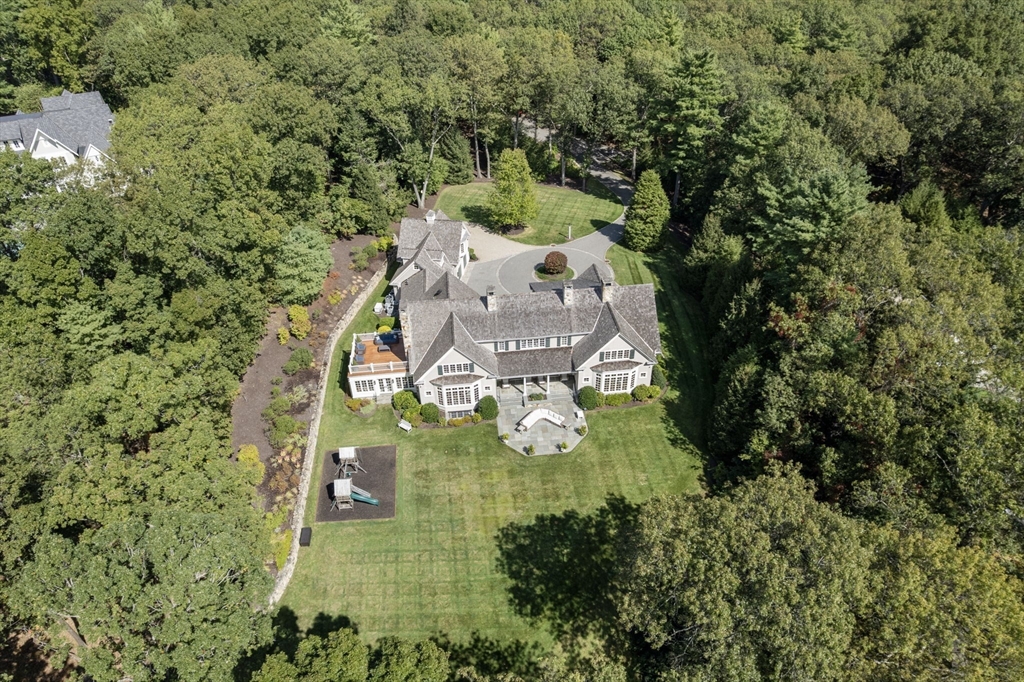 76 Robin Road Weston, MA 02493 - Photo 31 of 32 an aerial view of a house with yard swimming pool and outdoor seating