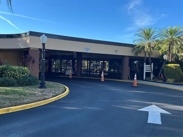 a view of a chairs and table in the patio