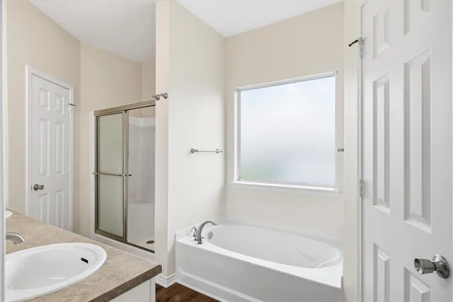 a living room with a large window and table