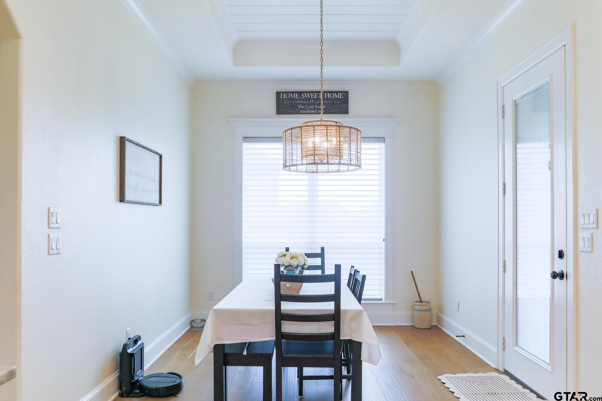9065 Shallow Cove Tyler, TX 75703 - Photo 22 of 40 a dining room with furniture and window