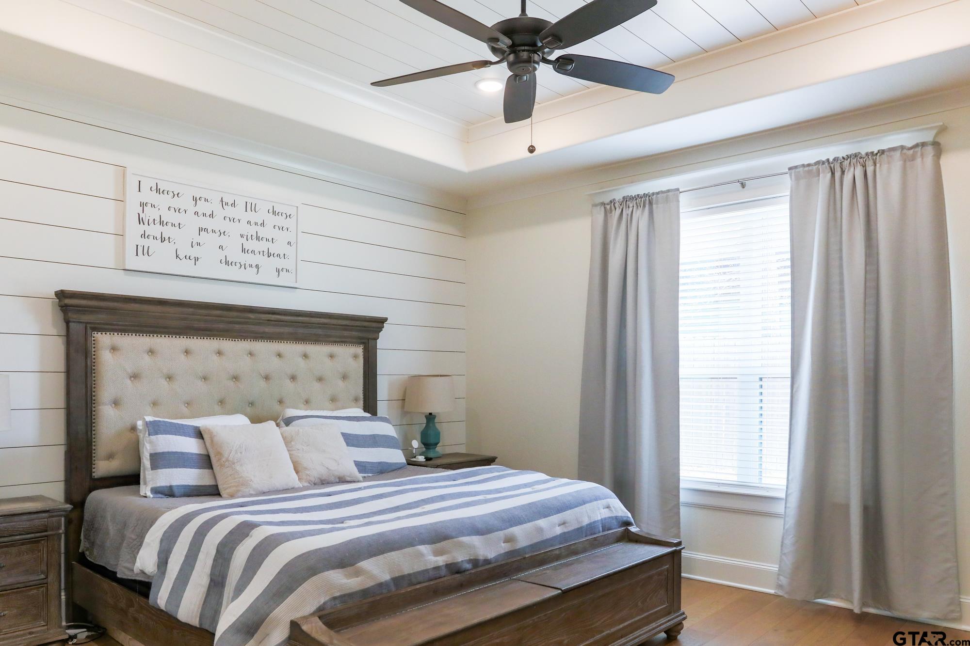 9065 Shallow Cove Tyler, TX 75703 - Photo 23 of 40 a bedroom with a bed and a window