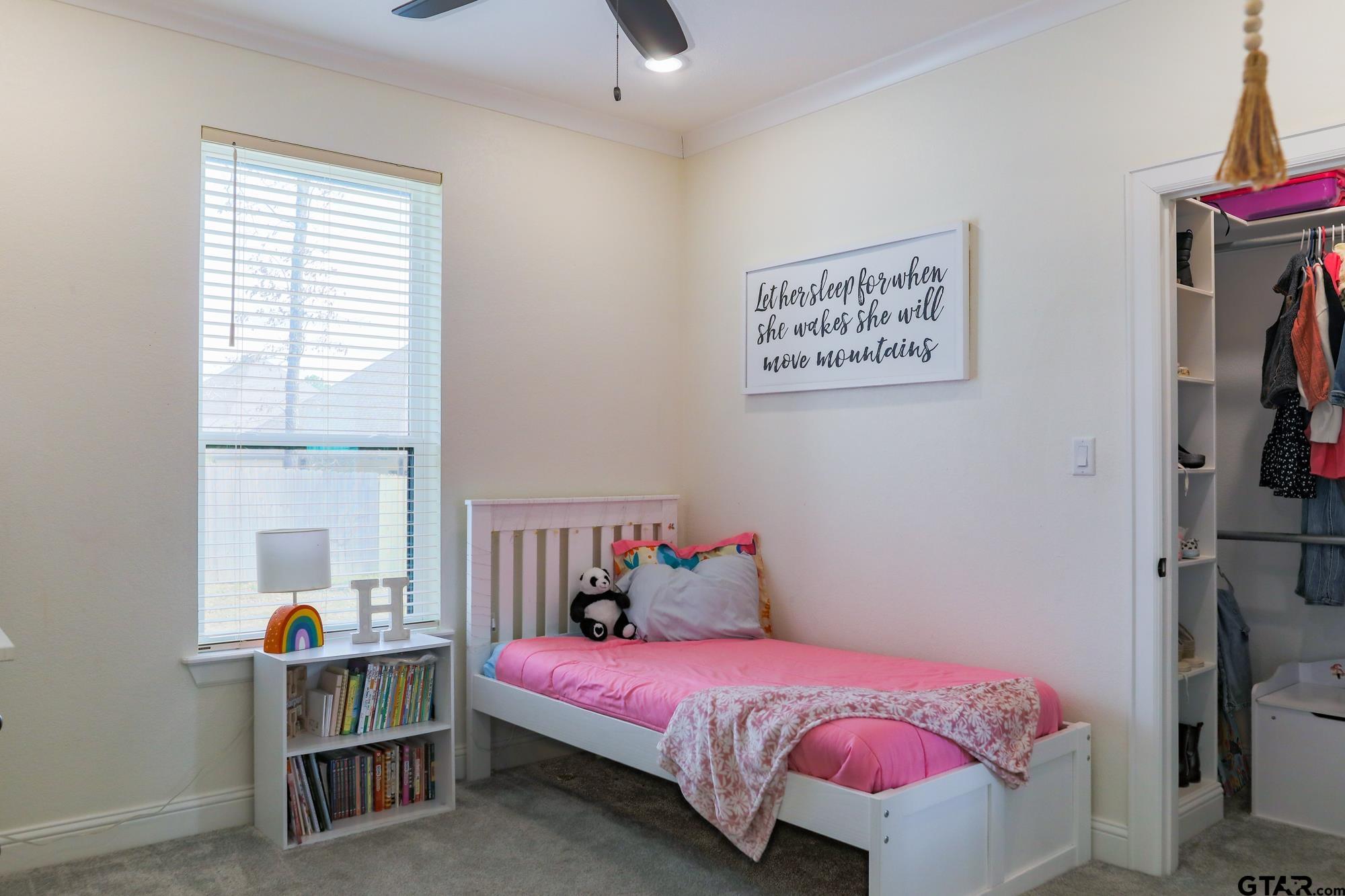 9065 Shallow Cove Tyler, TX 75703 - Photo 33 of 40 a bedroom with a bed and a window