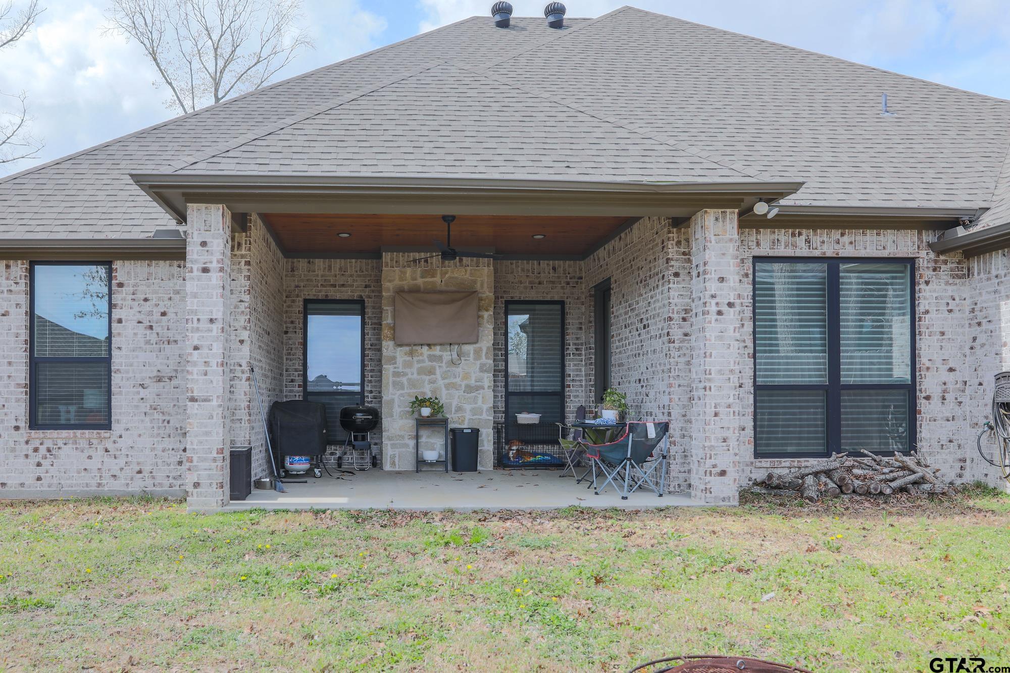 9065 Shallow Cove Tyler, TX 75703 - Photo 40 of 40 a view of a house with patio