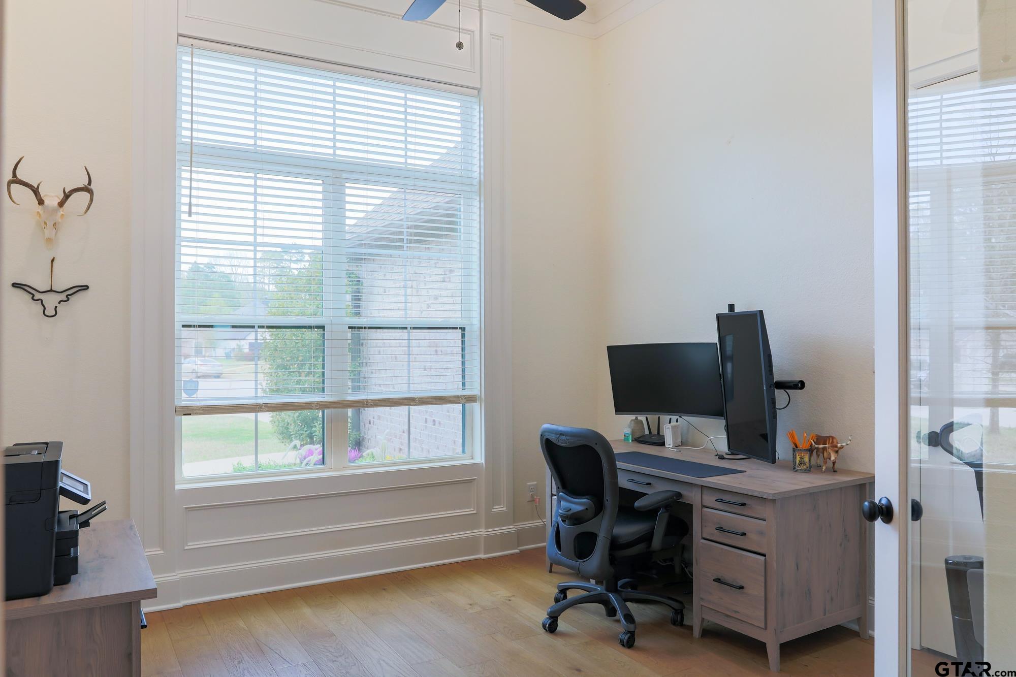 9065 Shallow Cove Tyler, TX 75703 - Photo 9 of 40 a view of a workspace with furniture and a window