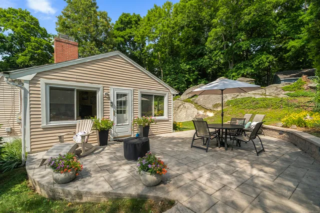 a view of a house with a patio