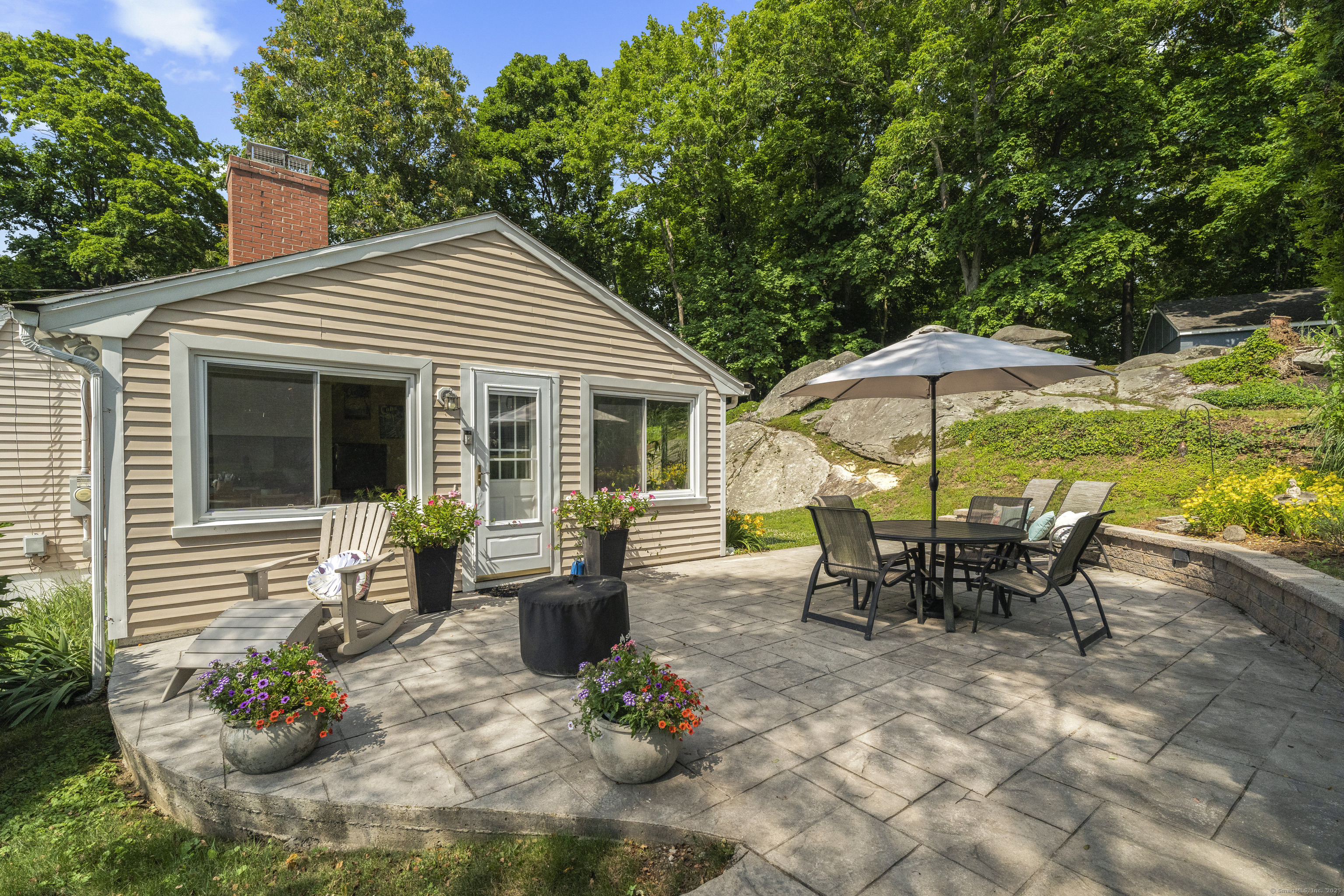 79 Fall Road Guilford, CT 06437 - Photo 1 of 1 a view of a house with a patio