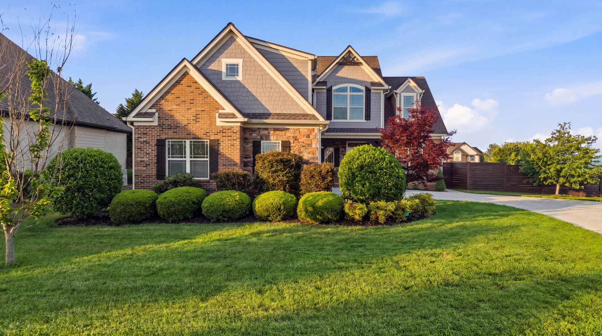 4046 Brock Road Chattanooga, TN 37421 - Photo 2 of 59 a view of a house with a yard and potted plants
