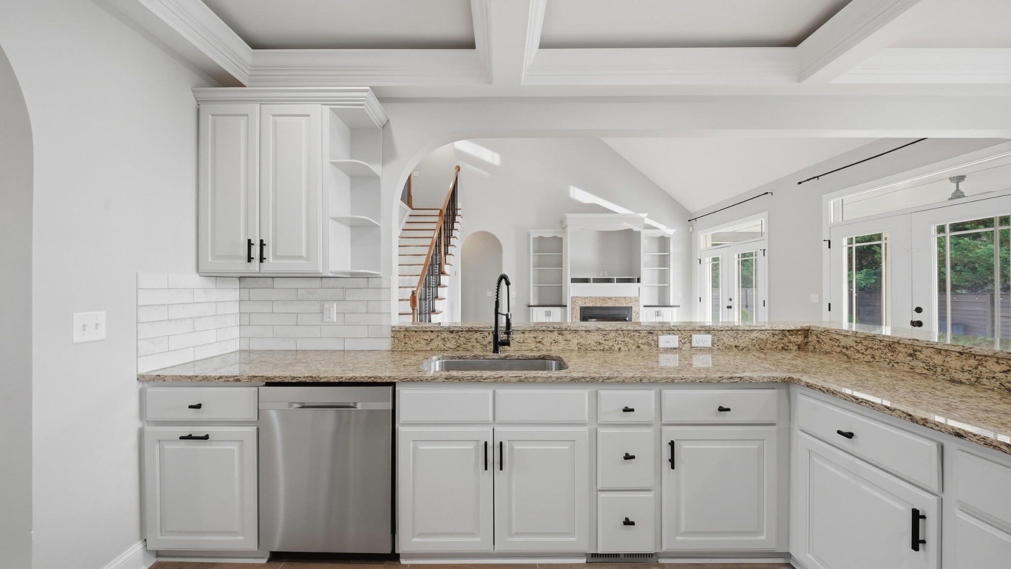 4046 Brock Road Chattanooga, TN 37421 - Photo 26 of 59 a white kitchen with granite countertop white cabinets and a sink