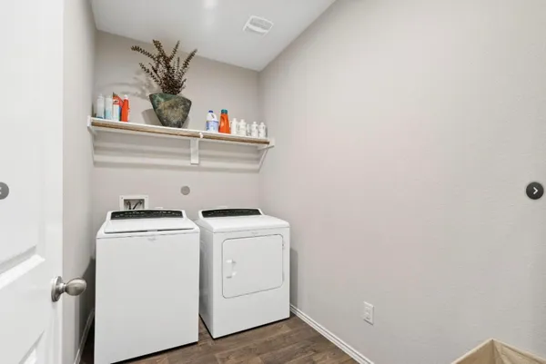 a utility room with dryer and washer