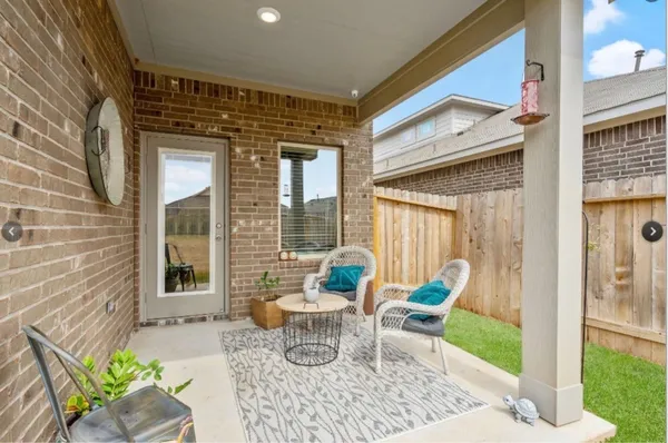 a patio view with a seating space