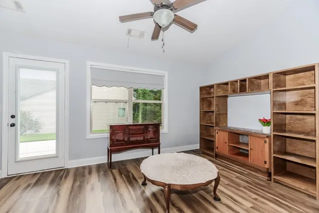 a room with furniture and a window