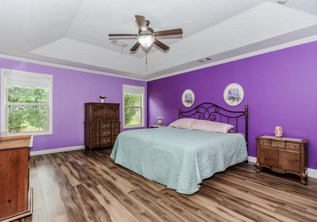 1411 Silvergate Way Winder, GA 30680 - Photo 21 of 38 a bedroom with a bed and a desk