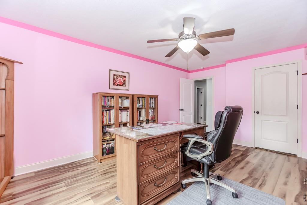 1411 Silvergate Way Winder, GA 30680 - Photo 28 of 38 a view of a workspace with furniture and a window