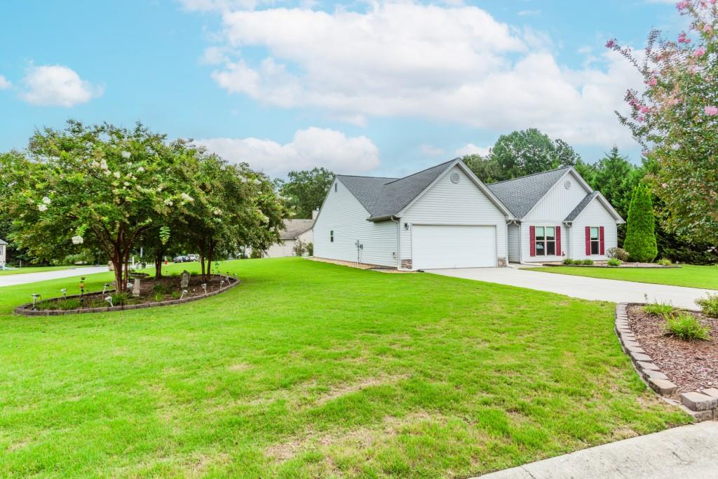1411 Silvergate Way Winder, GA 30680 - Photo 5 of 38 a view of a house with backyard