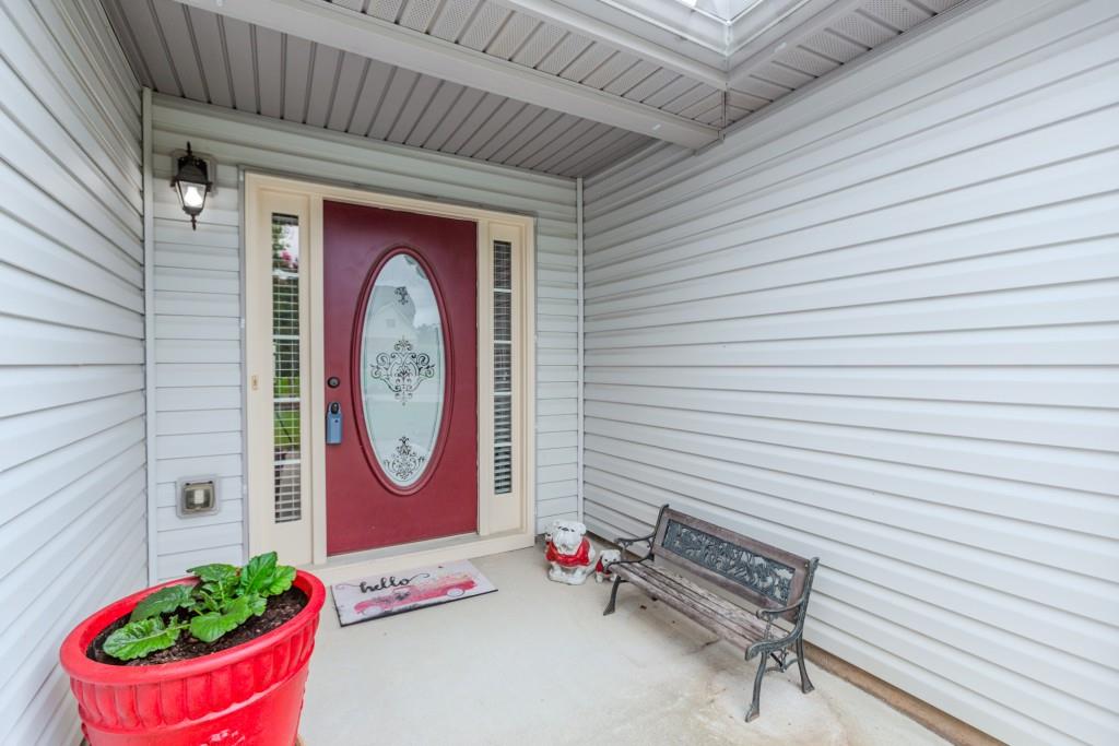 1411 Silvergate Way Winder, GA 30680 - Photo 6 of 38 a front view of a house with entryway
