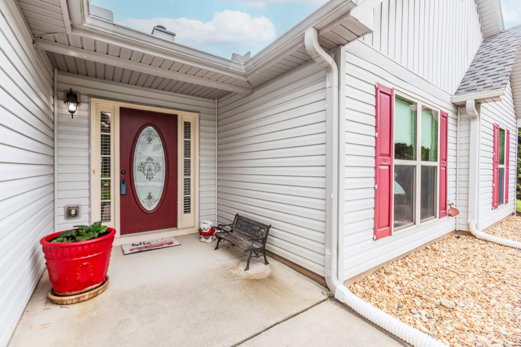 1411 Silvergate Way Winder, GA 30680 - Photo 7 of 38 a front view of a house with entryway