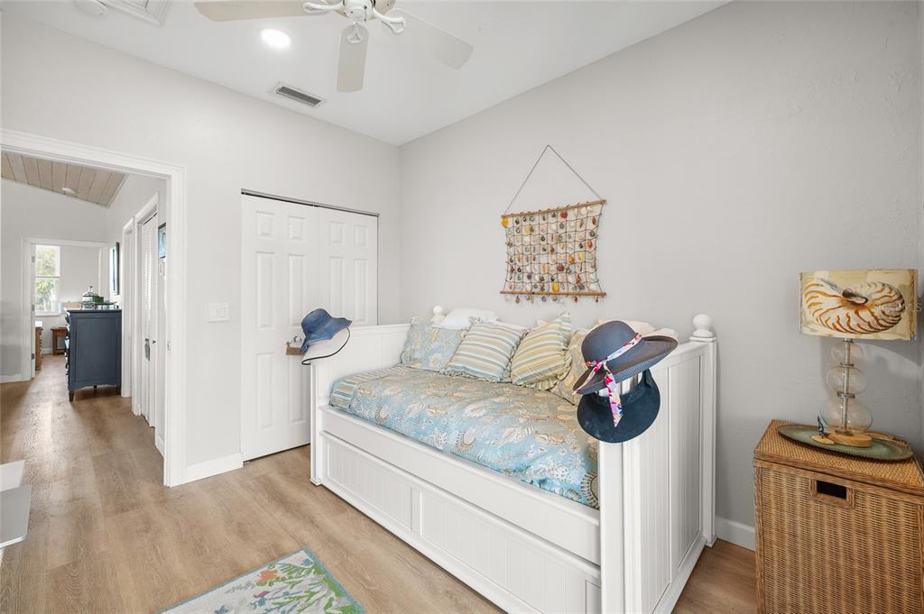9712 Little Gasparilla Placida, FL 33946 - Photo 38 of 58 a living room with furniture and a wooden floor