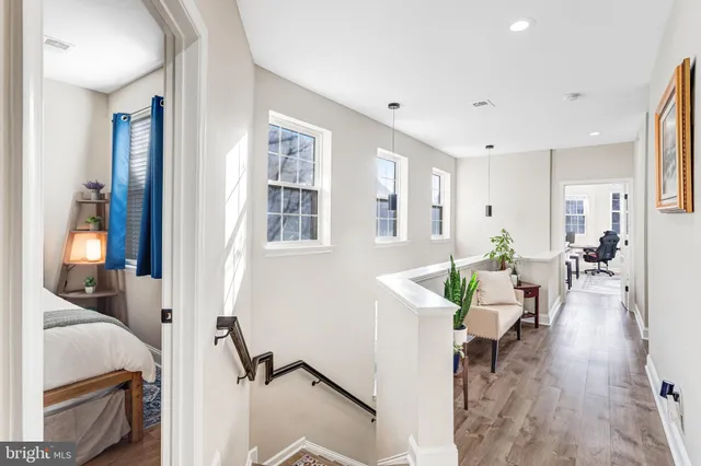a view of a living room and dining room