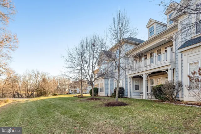 a view of a yard in front of a house